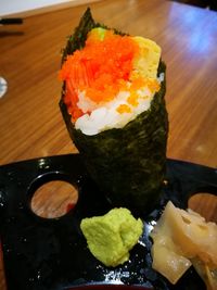 Close-up of sushi served on table