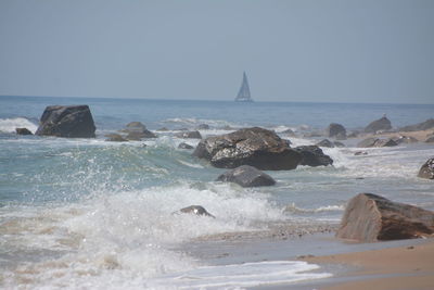 Scenic view of sea against clear sky