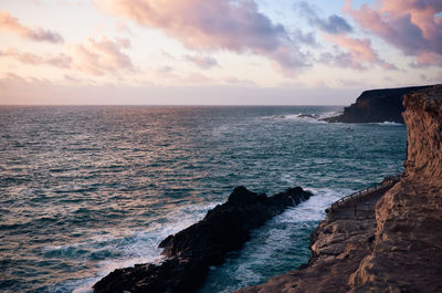 Scenic view of sea against sky during sunset