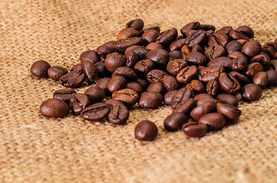 Close-up of coffee beans on burlap