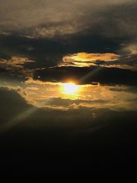 Scenic view of cloudy sky at sunset