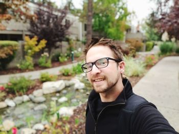 Portrait of young man wearing eyeglasses