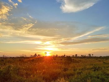 Scenic view of landscape against sky during sunset