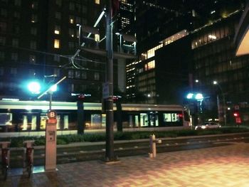 Illuminated street at night