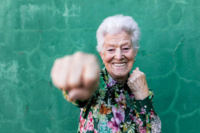 Portrait of smiling woman in swimming pool