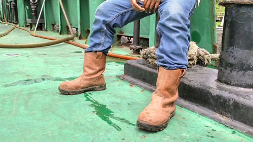 Low section of man at construction site