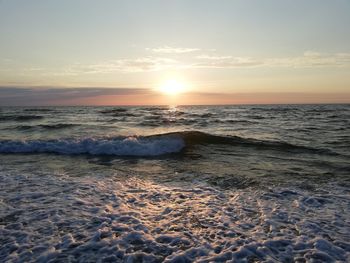 Scenic view of sea against sky during sunset