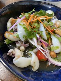 High angle view of chopped vegetables in bowl on table