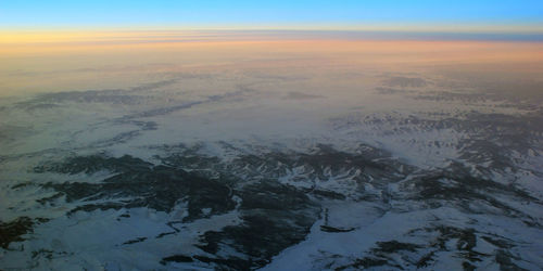 Morning dawn during a flight over siberia