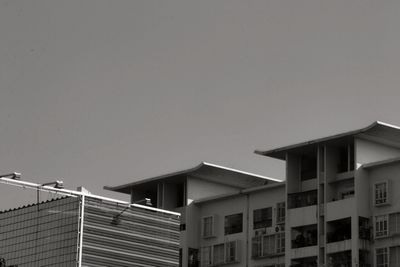 Low angle view of buildings against clear sky