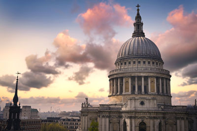 Low angle view of building against sky during sunset