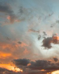 Low angle view of dramatic sky during sunset