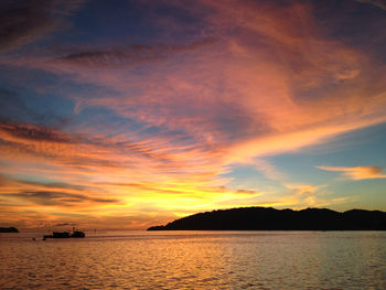 Scenic view of dramatic sky over sea