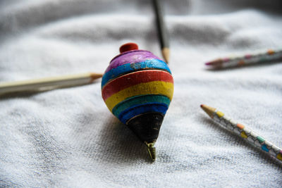 Close-up of spinning top on table