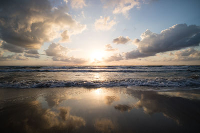 Scenic view of sea against sky during sunset