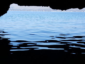 Close-up of frozen lake against sky