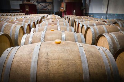 Close-up of wine bottles in row