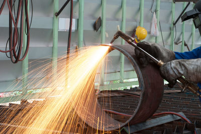 Close-up of man working in factory