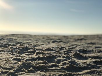 Surface level of land against clear sky