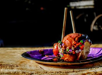 Close-up of served ice cream in plate on table