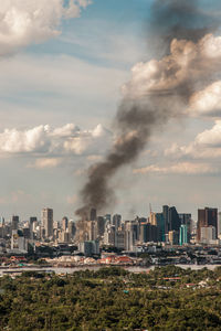 Buildings in city against sky