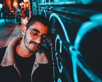 Portrait of young man looking away