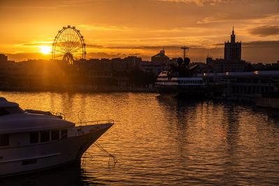 Scenic view of river during sunset