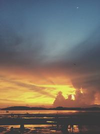 Scenic view of sea at sunset