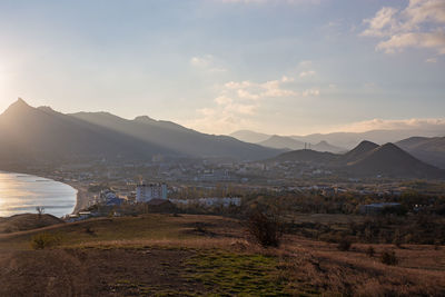 Scenic view of landscape against sky during sunset