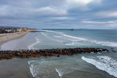 Aerial view of jetties and imperial beach pier daytime drone shot. high quality photo