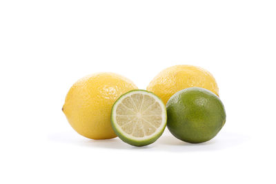 Close-up of fruits against white background