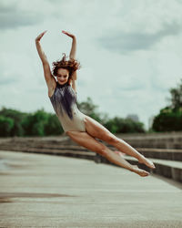 Full length of woman dancing 