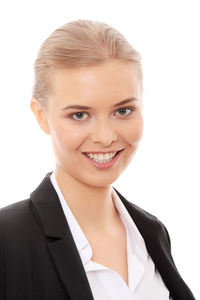 Portrait of a smiling young woman over white background