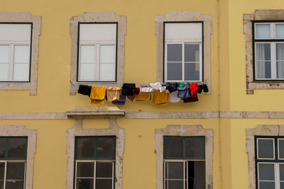 Clothes drying against building