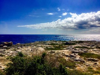 Scenic view of calm sea against sky