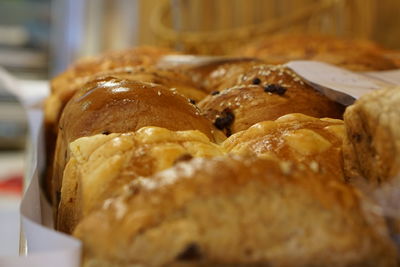 Close-up of puff pastries in box for sale