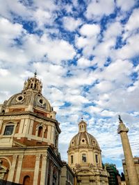 Low angle view of cathedral against cloudy sky