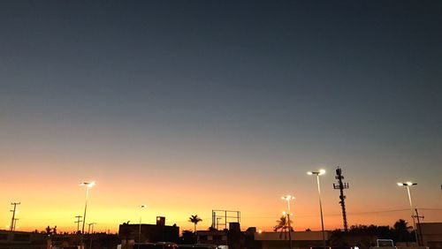 Cityscape against sky during sunset