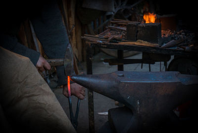 Cropped image on man working at workshop