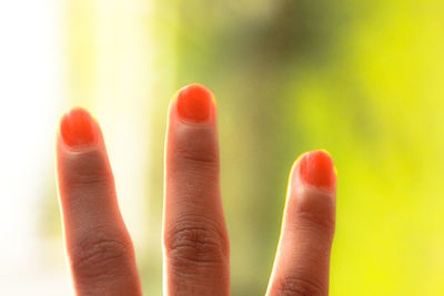 Close-up of human hand with nail varnish