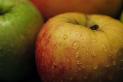 Close-up of wet apple in water