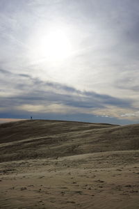 Scenic view of desert against sky