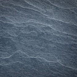 Full frame shot of rocks on sea