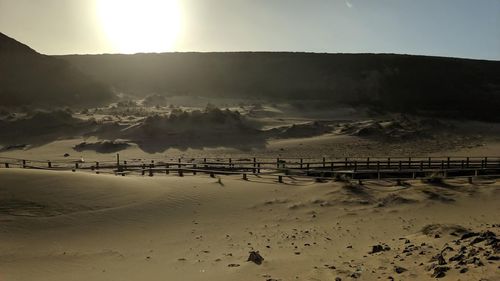 Scenic view of beach against sky