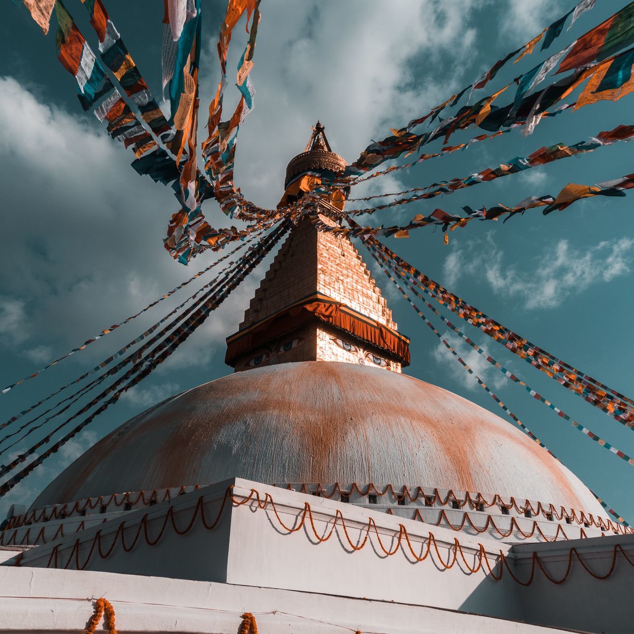 sky, built structure, cloud - sky, architecture, belief, religion, place of worship, spirituality, building exterior, nature, low angle view, building, no people, decoration, travel destinations, travel, dusk, tourism, outdoors, spire