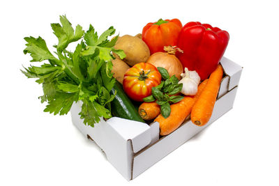 Fruits and vegetables on white background