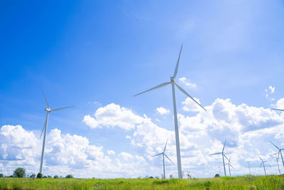 The wind turbines used to generate electricity provide clean energy to the earth on clear days.