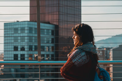 View of woman standing in city