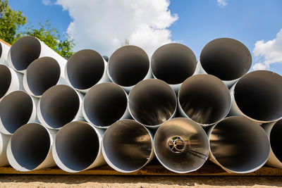 Downpipe warehouse. steel pipes, parts for the construction of a roof drainage system in a warehouse