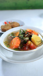 Sop sumsum langsa is a traditional food from medan, indonesia. this soup consists of large 